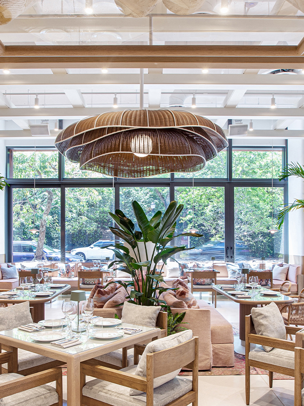 Hand-woven rattan lighting in Amal Miami